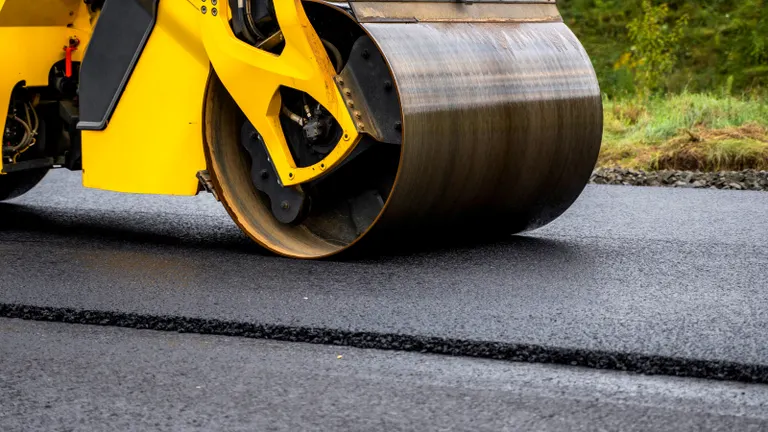 Úthenger dob közelről munka közben